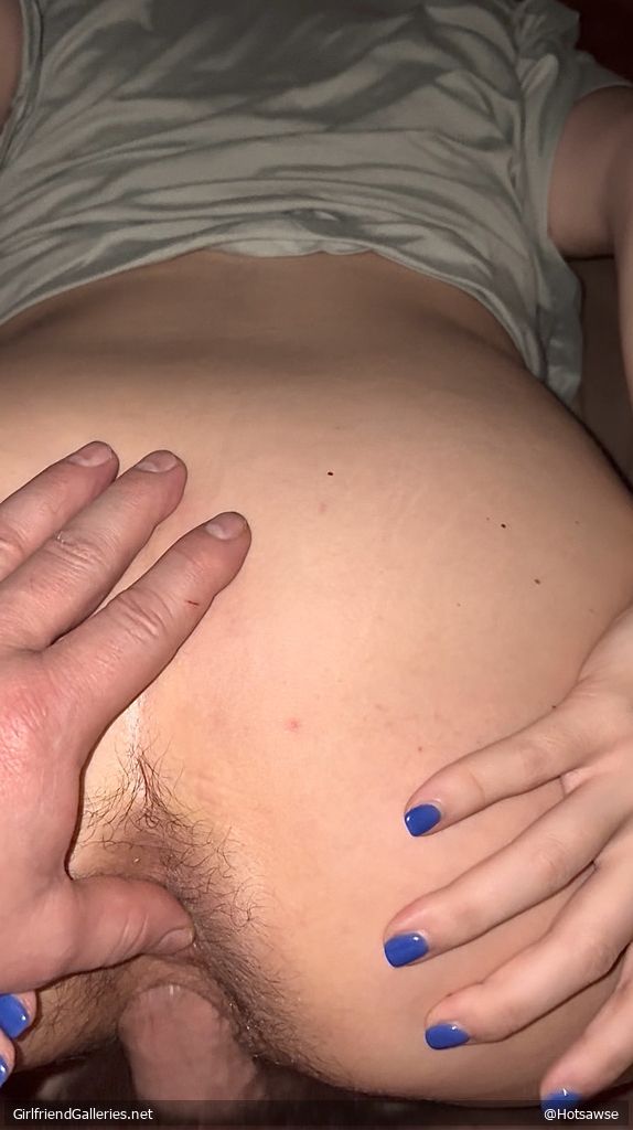 Spreading her hairy asshole
