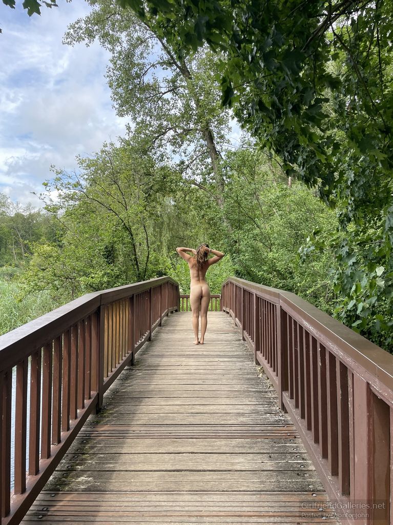 Naked on a bridge