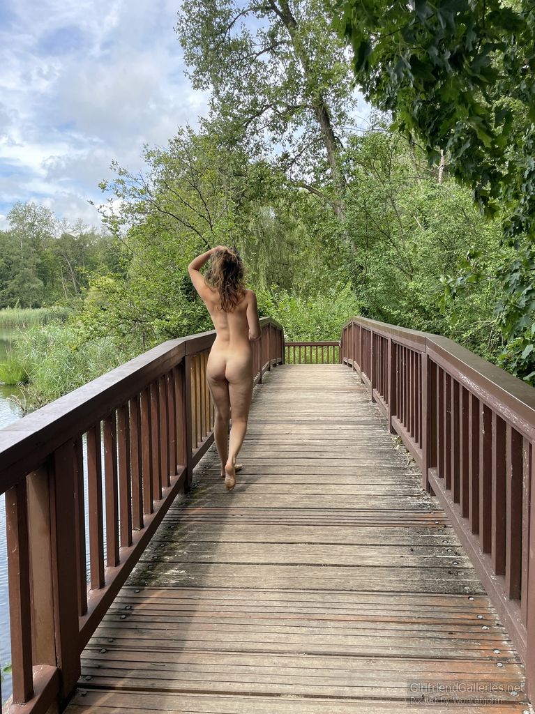 Naked on a bridge