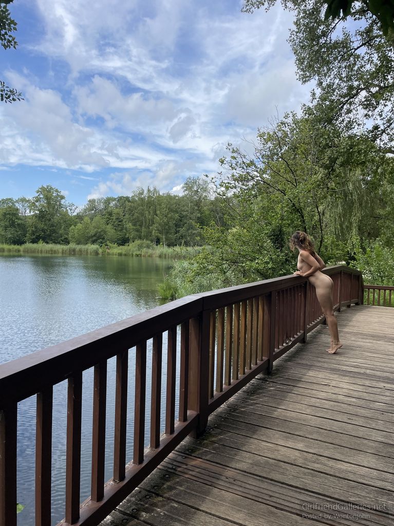 Naked on a bridge