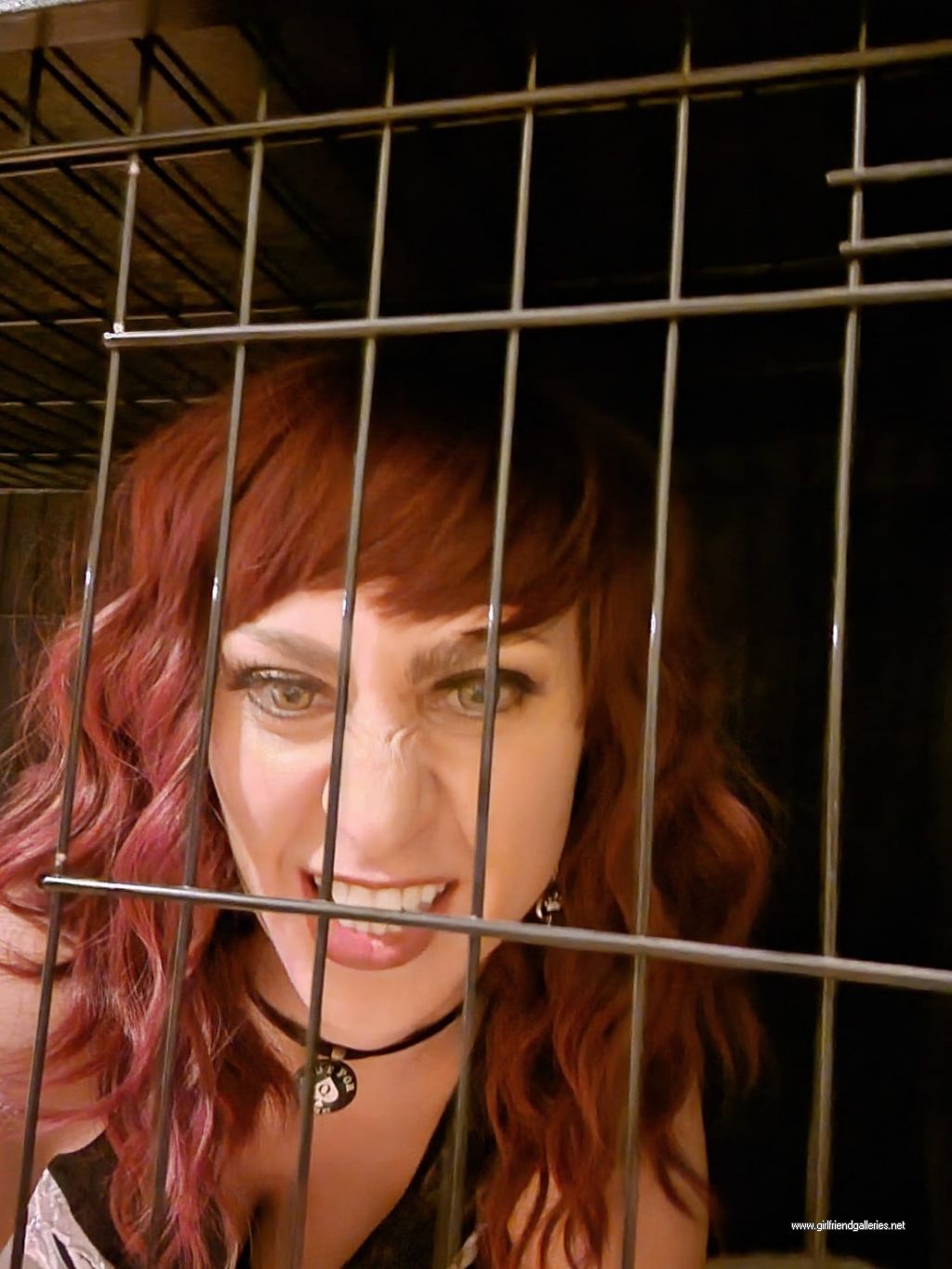 Slutty Bitch wife in a dog cage
