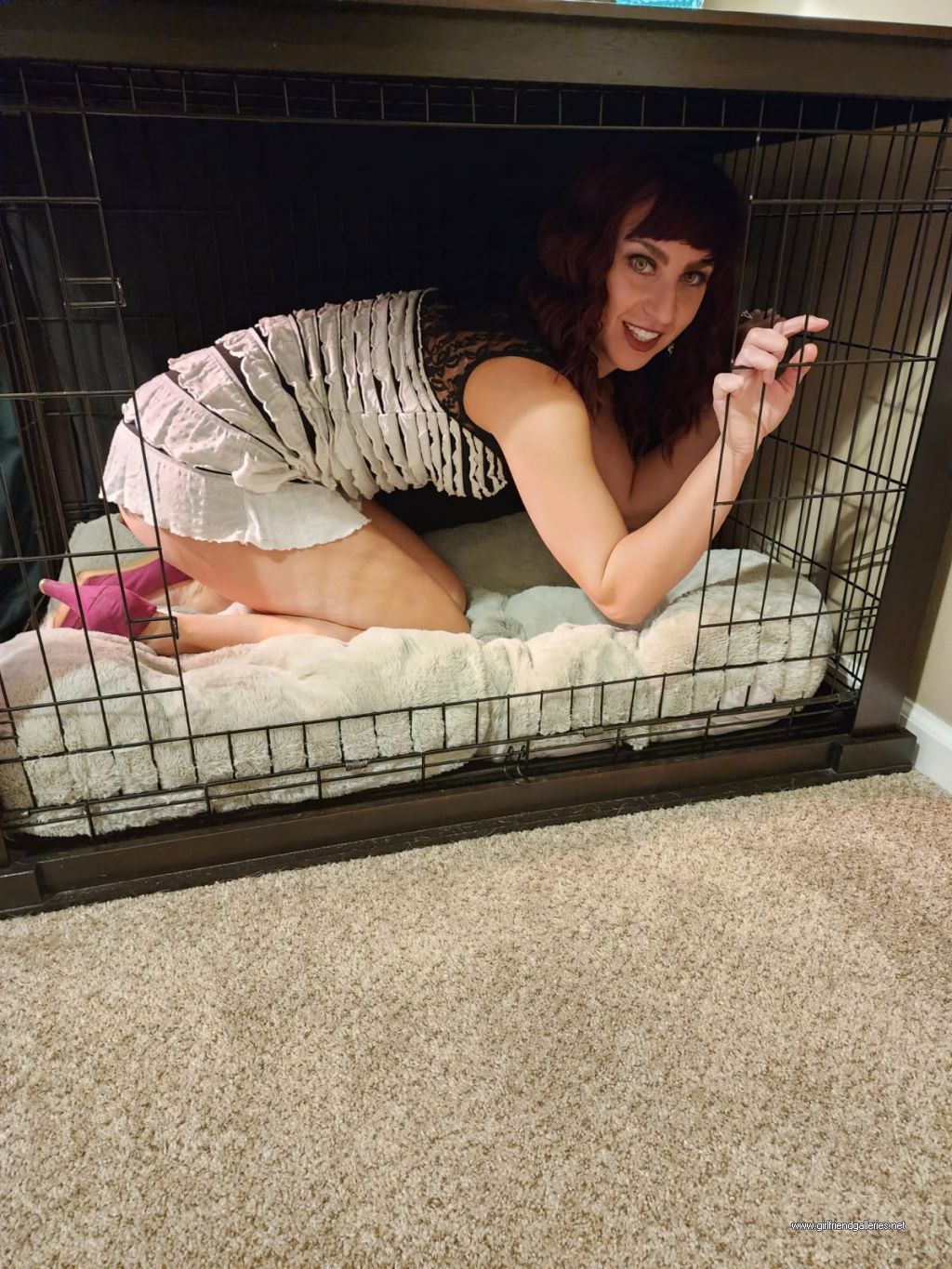 Slutty Bitch wife in a dog cage