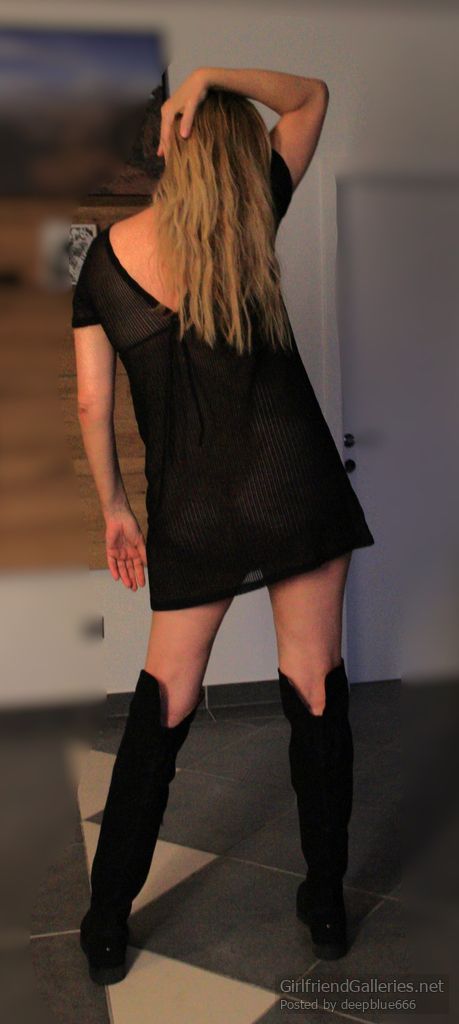 Posing in a small transparent dress