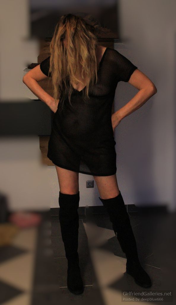 Posing in a small transparent dress