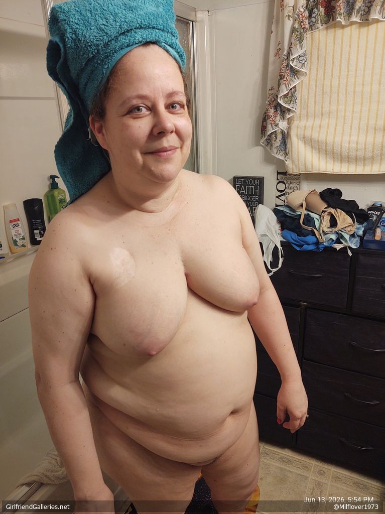 The wife taking a shower