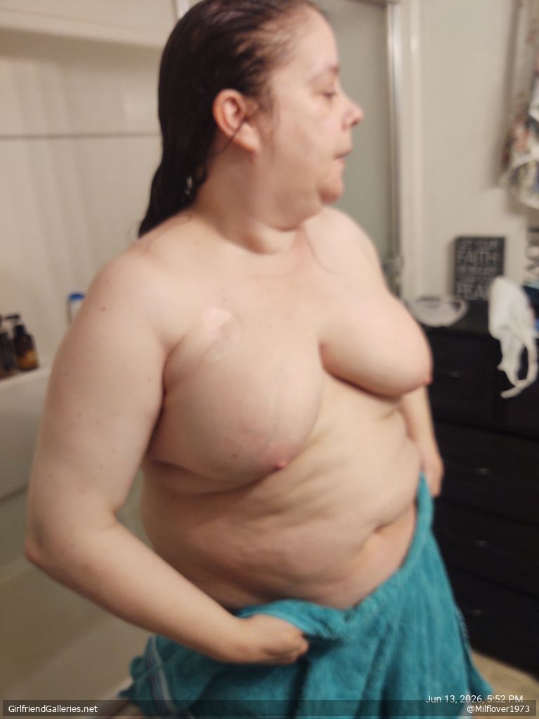 The wife taking a shower