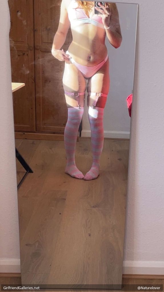 Teasing with her pink outfit