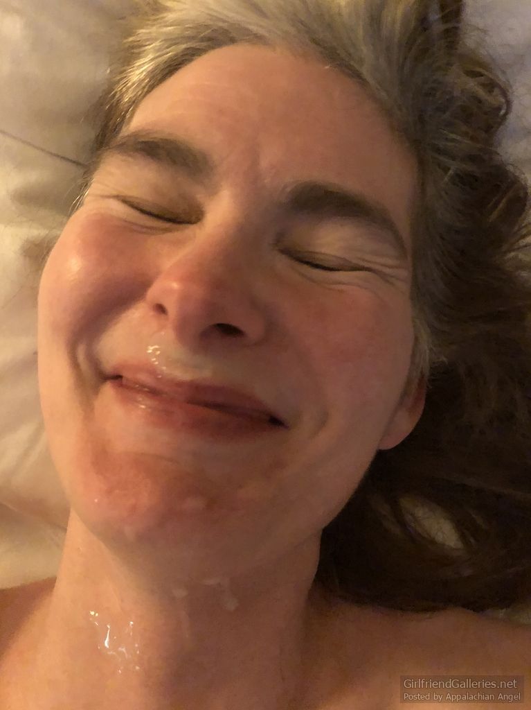 An angel on a hotel bed