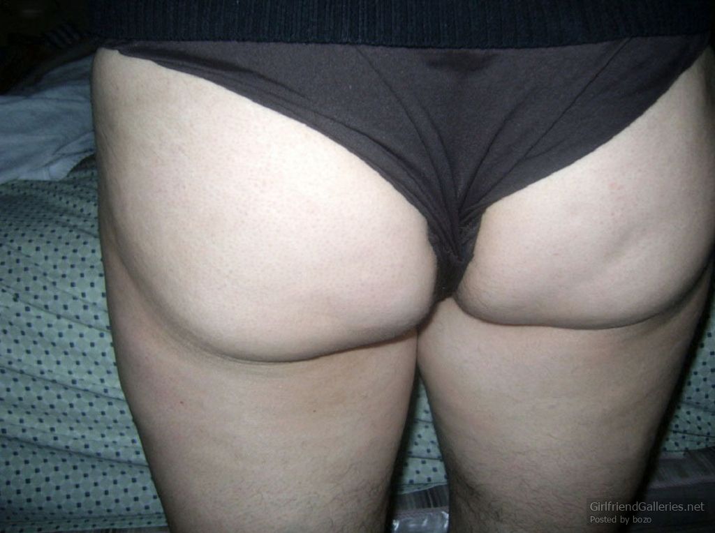 My hairy wife taking off her bikini