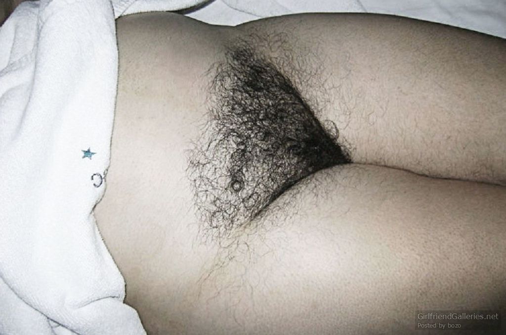 My hairy wife taking off her bikini