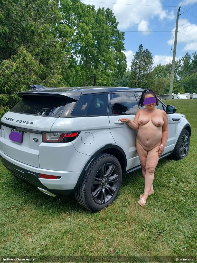 She loves her car almost as much as her boobs