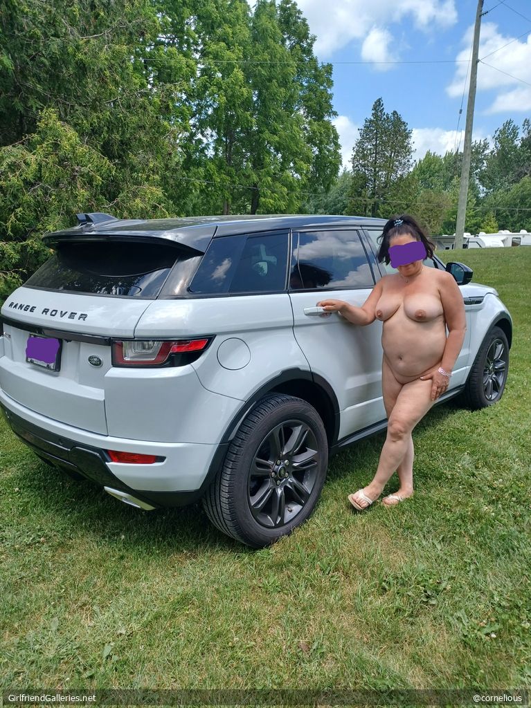 She loves her car almost as much as her boobs