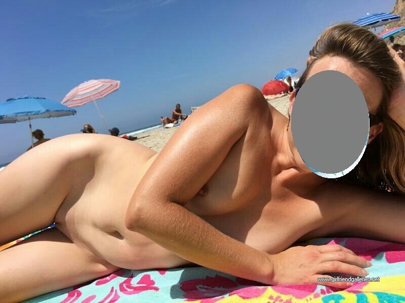 Nude wife on the beach
